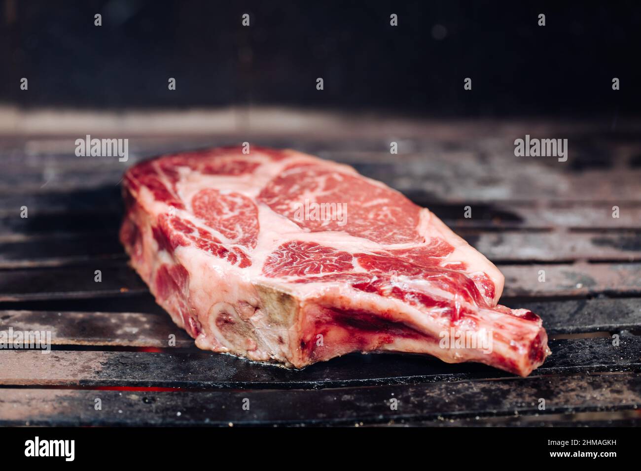 Various steak selection including rib eye, t-bone, fillet steak and rump steak. Tenderloin and sirloin cuts. Organic dry aged beef. Stock Photo