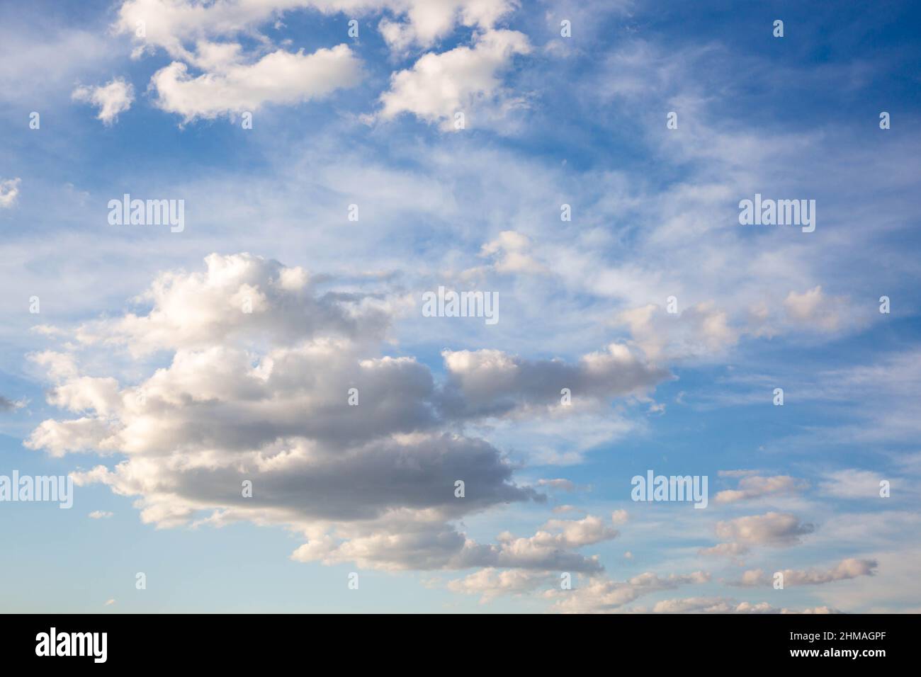 blue sky background with white fluffy clouds on sunny day Stock Photo ...