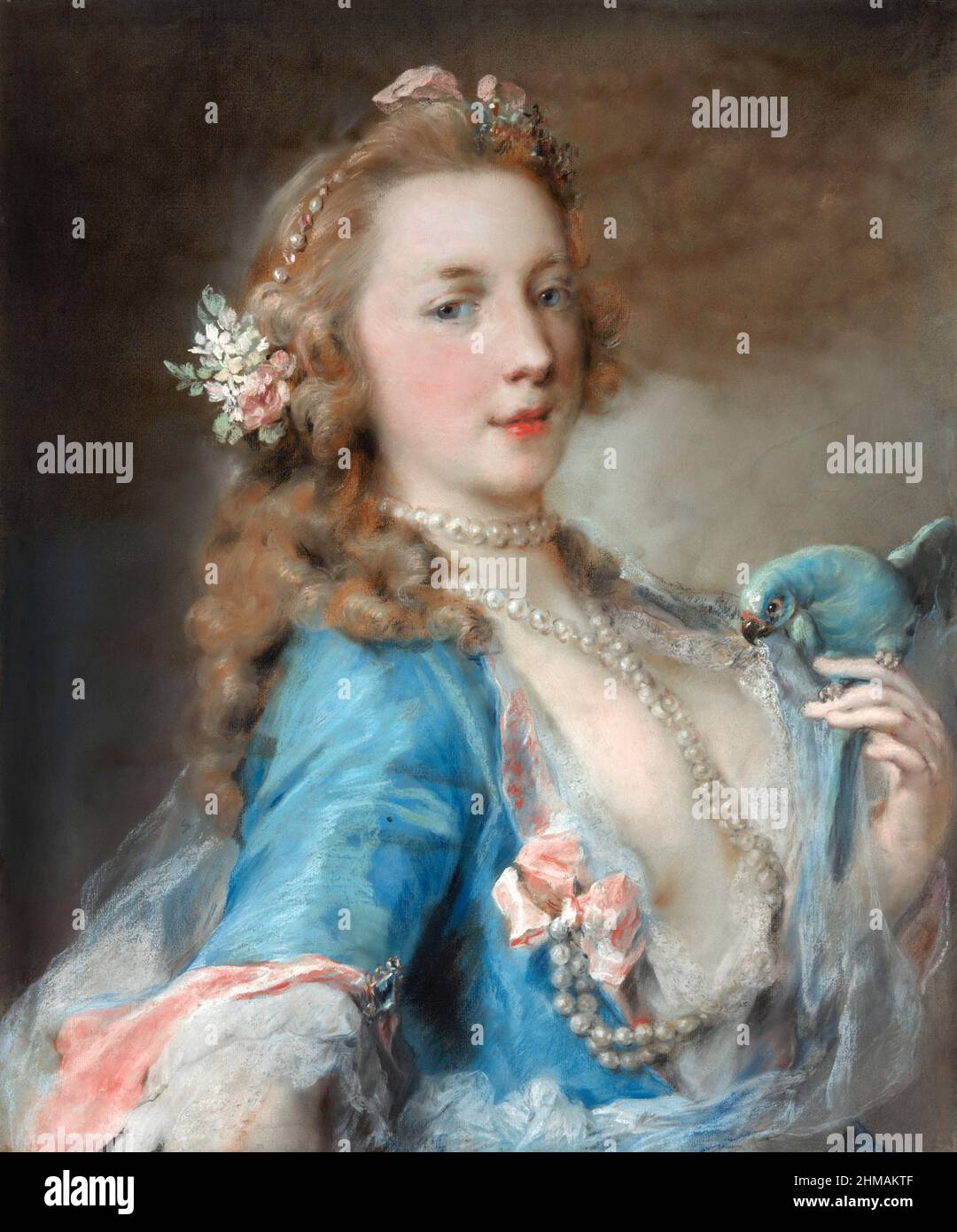 A Young Lady with a Parrot by Rosalba Carriera (1673-1757), pastel on blue laid paper mounted on laminated paper board, c. 1730 Stock Photo