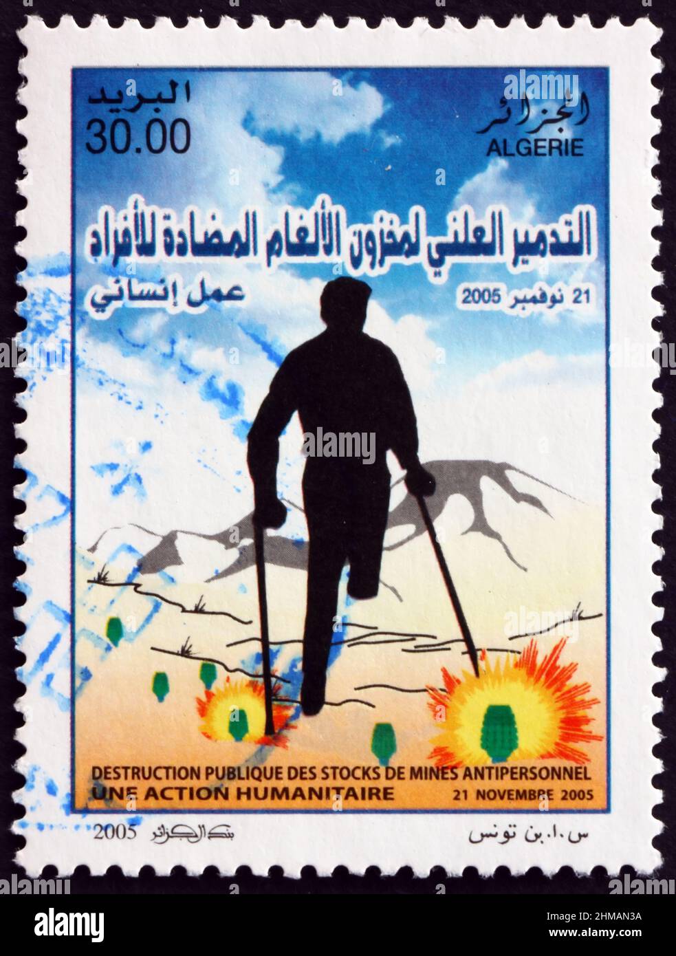 ALGERIA - CIRCA 2005: a stamp printed in Algeria dedicated to public destruction of mines, circa 2005 Stock Photo