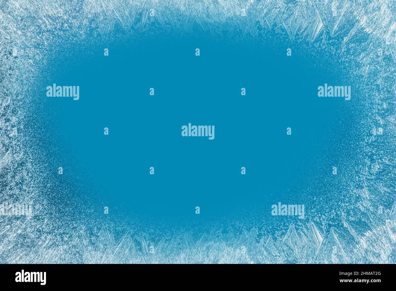 Frost patterns on frozen winter window as a symbol of Christmas wonder ...