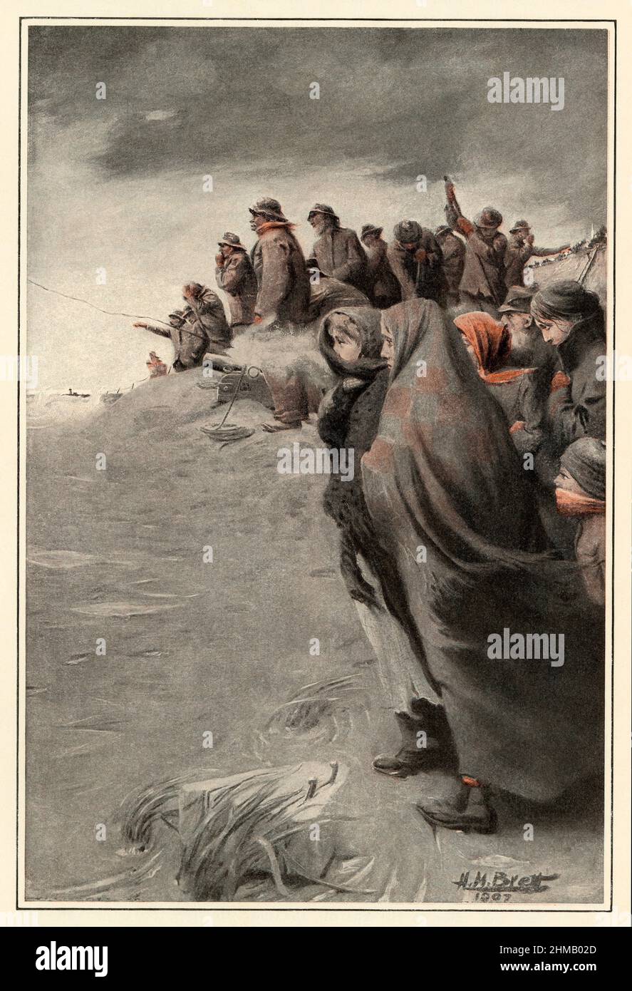 US Life-Saving Service crew shooting a line to a ship wrecked off Cape Cod, early 1900s. Duotone of an H. M. Brett illustration Stock Photo