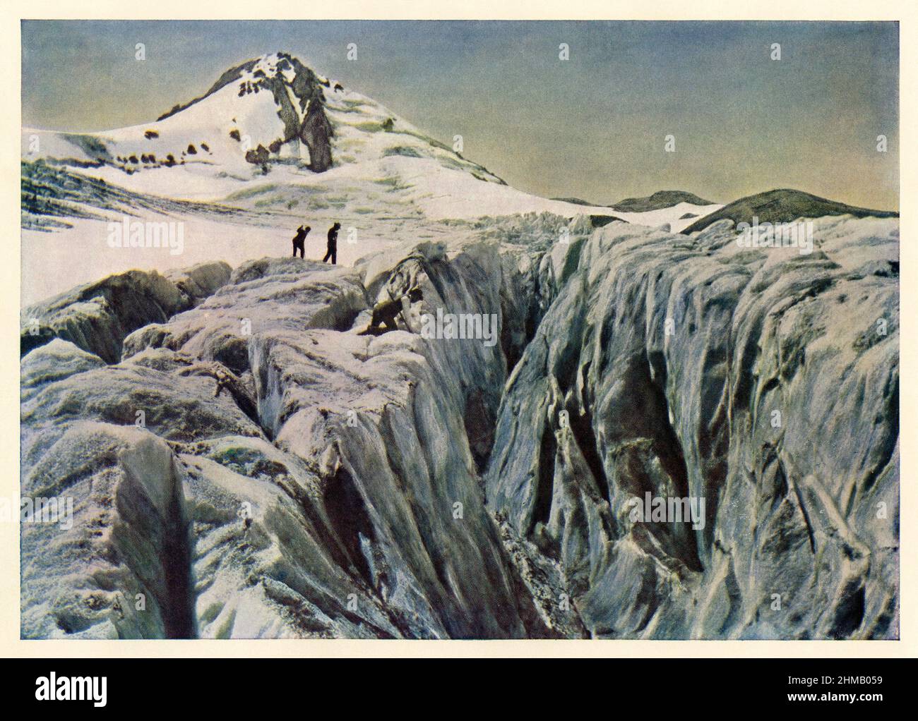 Climbers on Eliot Glacier, Mount Hood, Oregon, early 1900s. Color halftone of a photograph Stock Photo