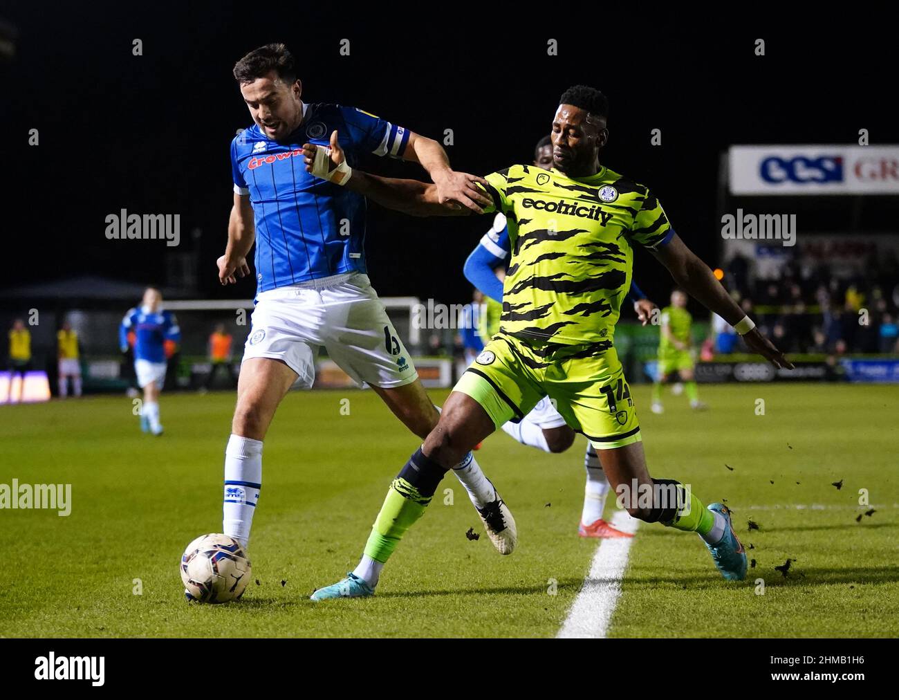 Rochdale's Eoghan O'Connell (left) and Forest Green Rovers' Jamille Matt battle for the ball during the Sky Bet League Two match at The Fully Charged New Lawn, Nailsworth. Picture date: Tuesday February 8, 2022. Stock Photo