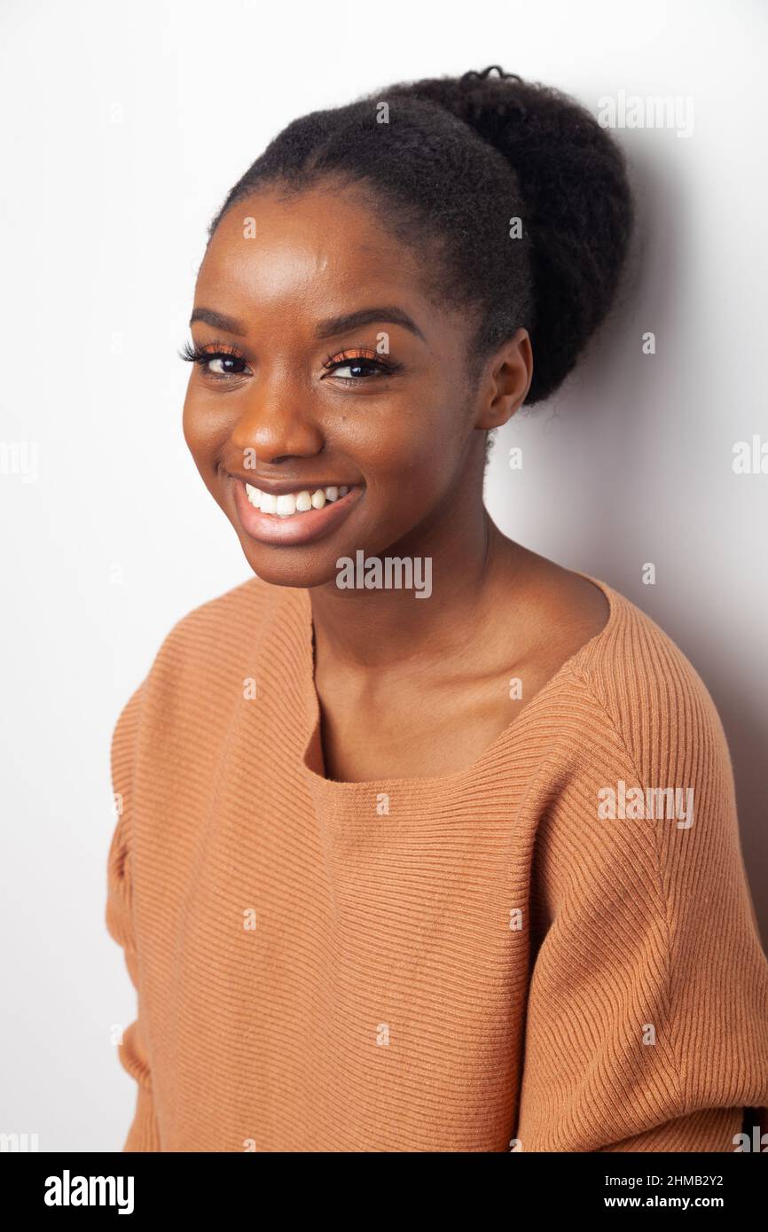 Side profile portrait of a beautiful black woman. Stock Photo