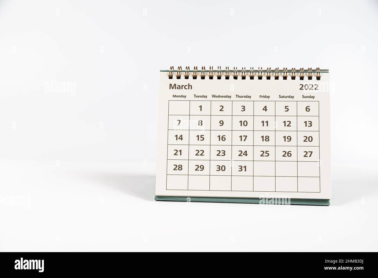 March 2022 paper calendar month page on white background Stock Photo