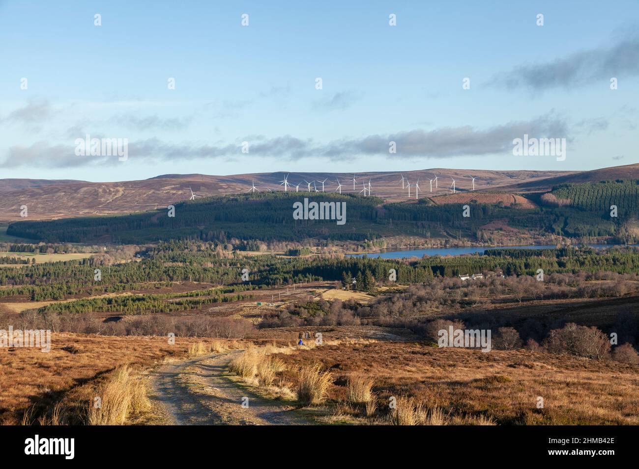 A wind farm above the Freshwater Loch Moy near in Moy near Invermess. Stock Photo