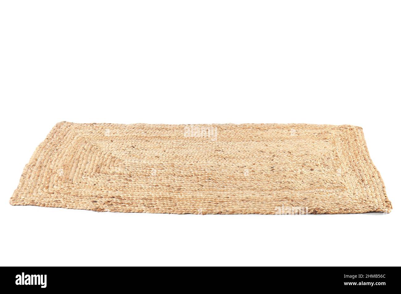 Stylish wicker carpet on white background Stock Photo - Alamy