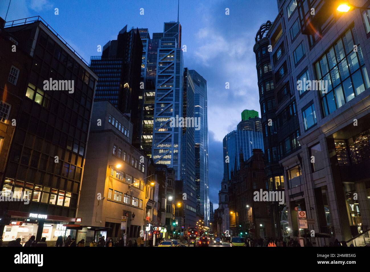 London, UK, 6 February 2022: Dusk views along Bishopsgate in the City of London, where buses and taxis bring people to Liverpool Street station. Anna Stock Photo