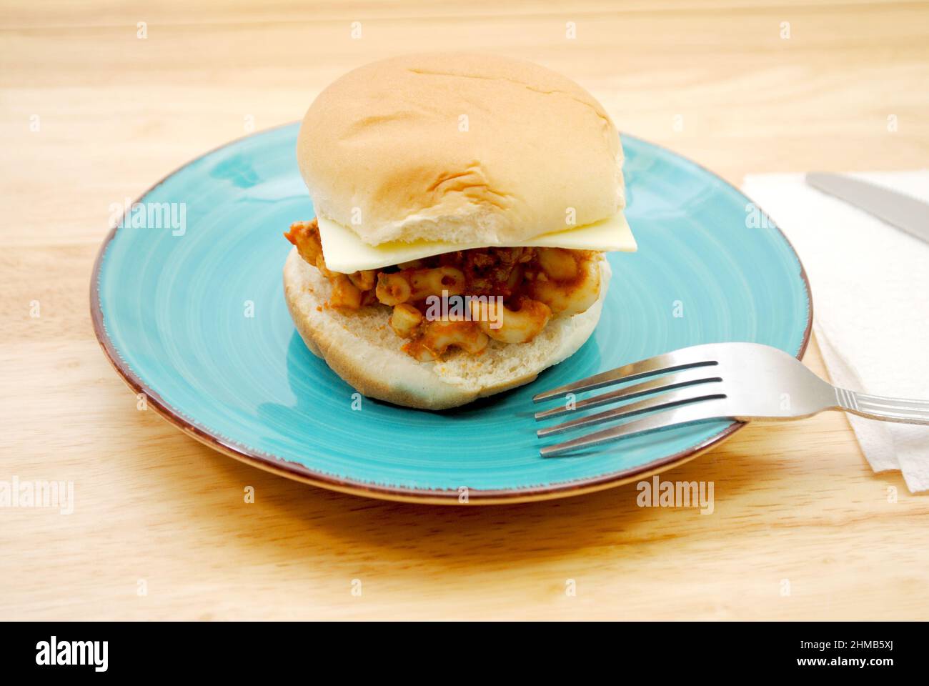 Macaroni Sandwich with Cheese Served on a Blue Plated Stock Photo