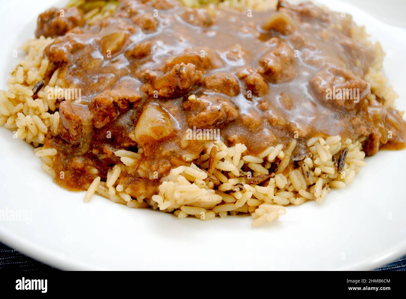 Hamburg gravy over wild rice hires stock photography and images Alamy