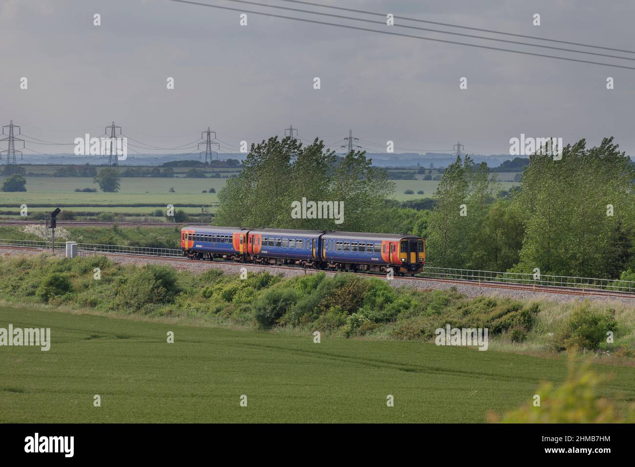 Allington (west of Grantham) east Midlands trains class 156 156411 + class 153 153383 working train 2S23 the 1545 Nottingham - Skegness Stock Photo