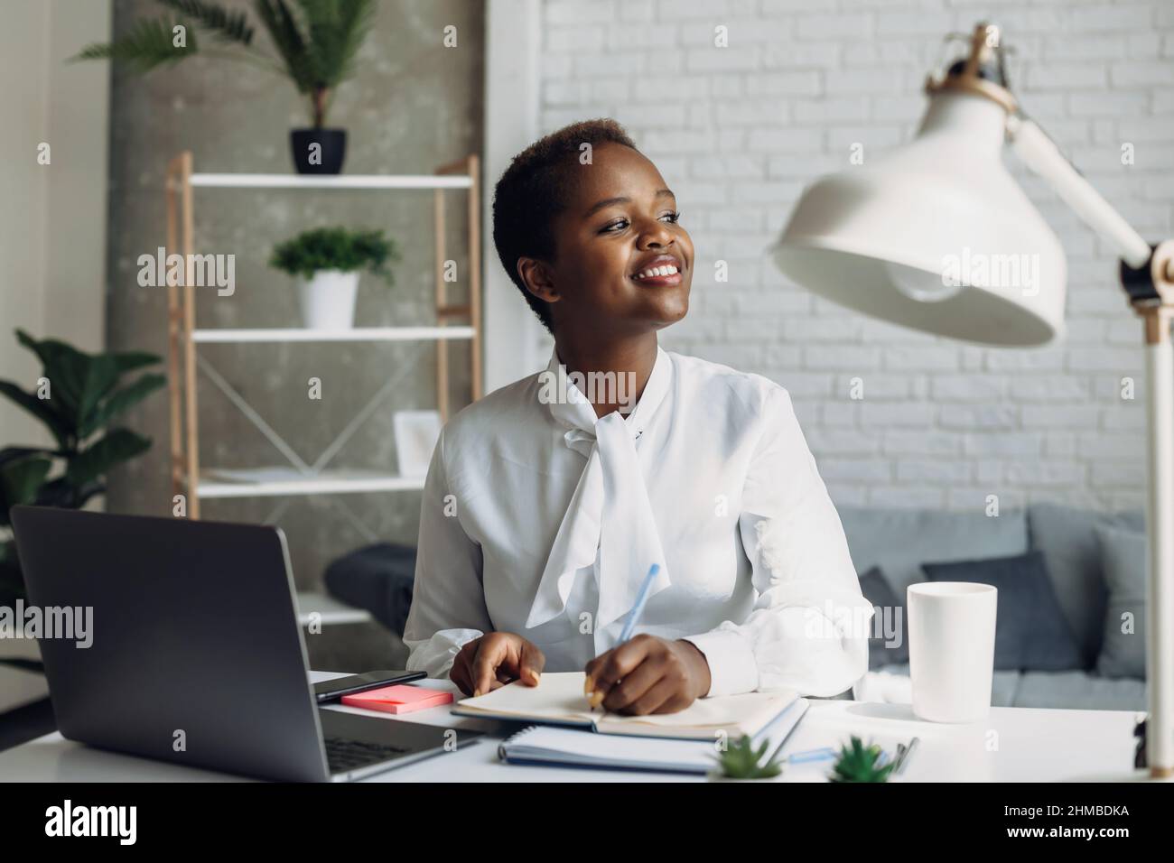 African american woman taking notes hi-res stock photography and images ...