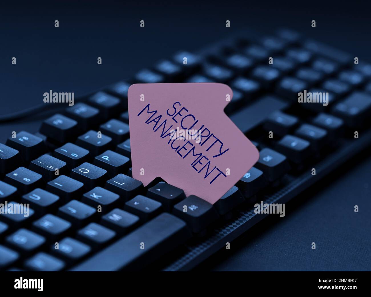 Hand writing sign Security Management. Business approach is the ...