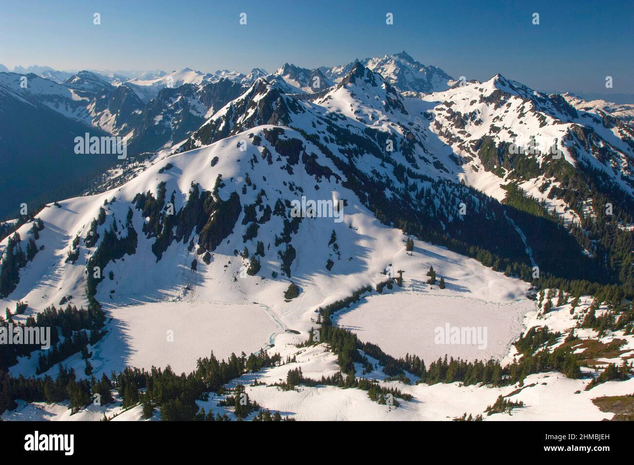 Twin Lakes  and Winchester Mountain Lookout in Winter Aerial Stock Photo