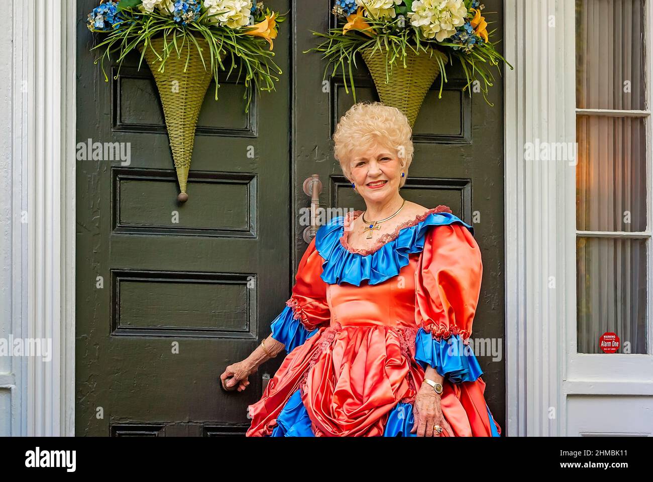 A homeowner welcomes guests to Rosewood Manor, April 16, 2010, in Columbus, Mississippi. Stock Photo
