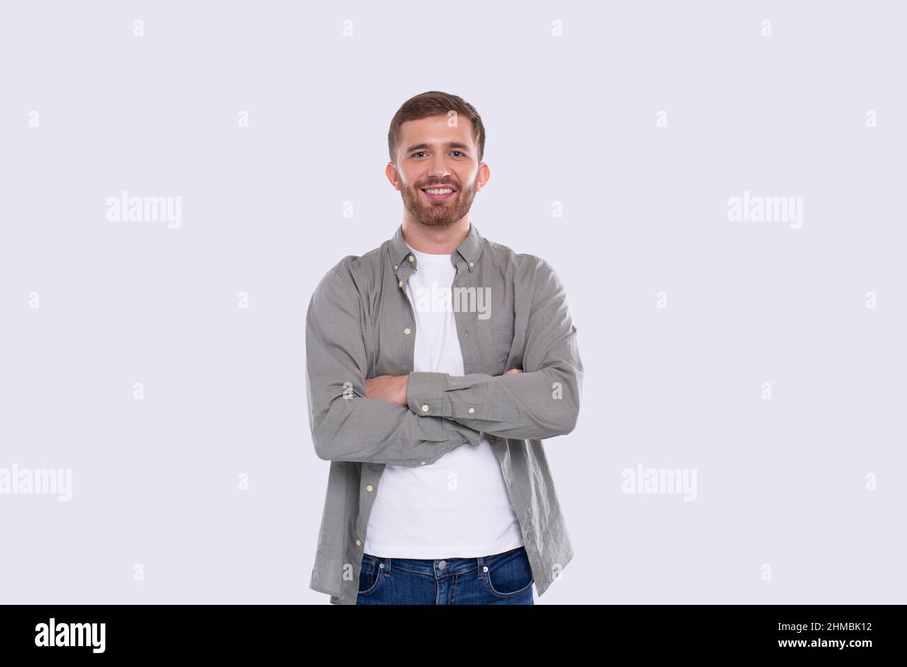 Man Hands Crossed Standing Isolated Smilling. Man Posing Stock Photo