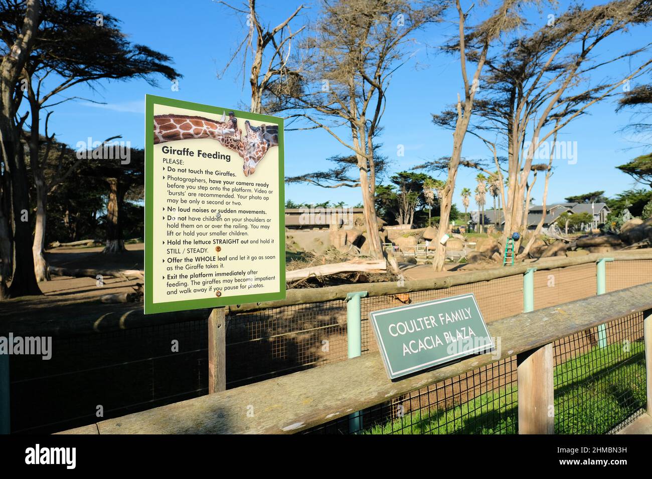 Giraffe feeding guidelines sign at the Coulter Family Acacia Plaza at
