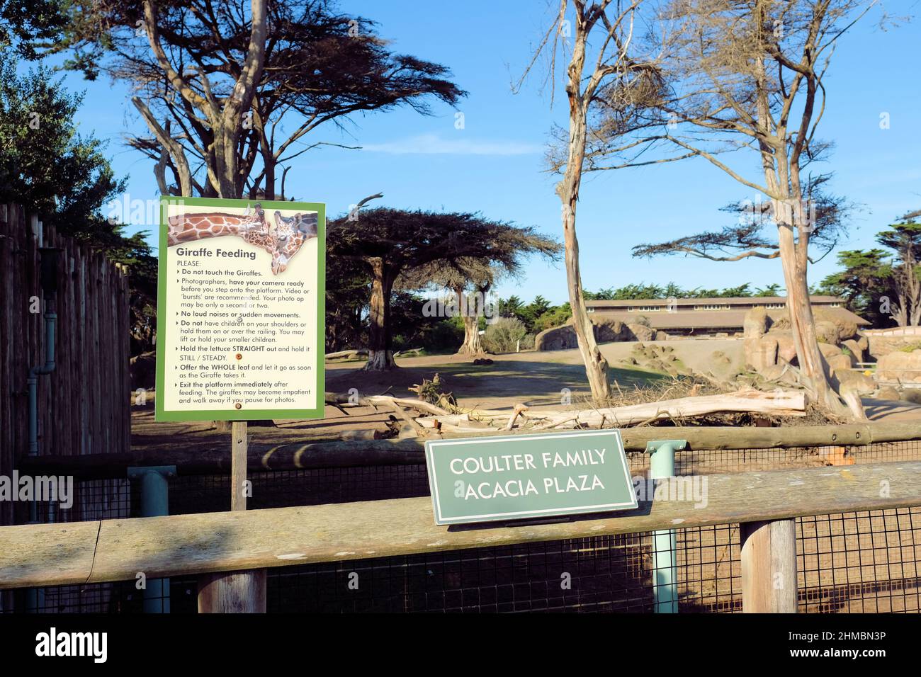Giraffe feeding guidelines sign at the Coulter Family Acacia Plaza at