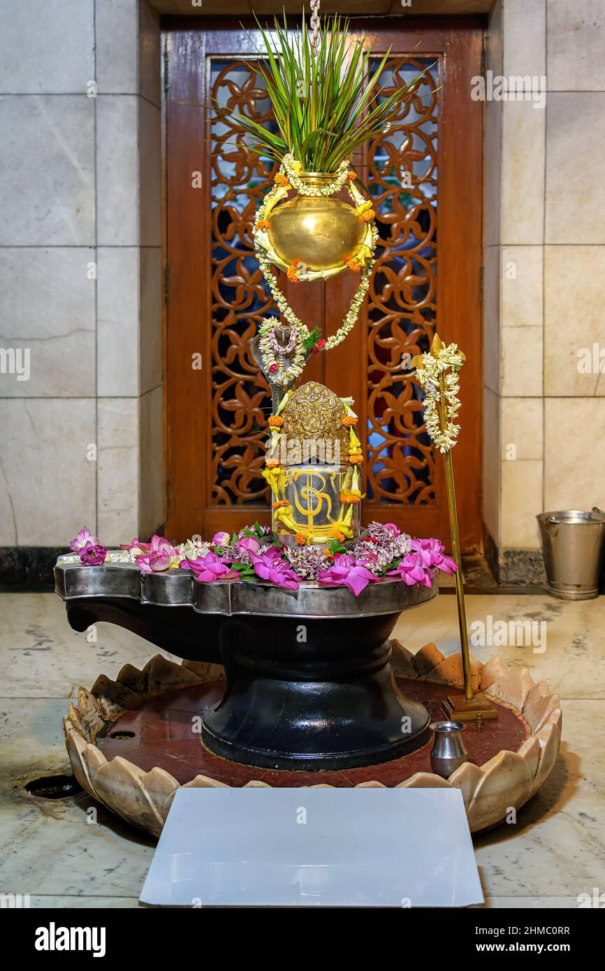 Beautiful Picture of a Shiv Ling or Shiva Lingam, is decorated at a temple in India. Stock Photo