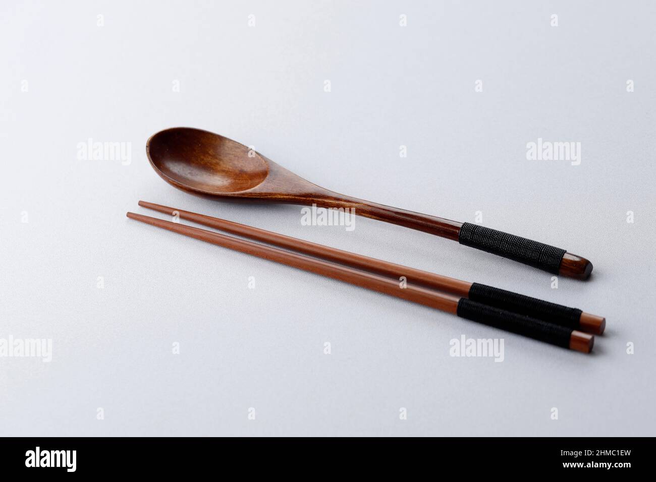Korean Spoon and Chopstick Wooden Cutlery Isolated on White Table, Copy Space, Eat Concept Stock Photo