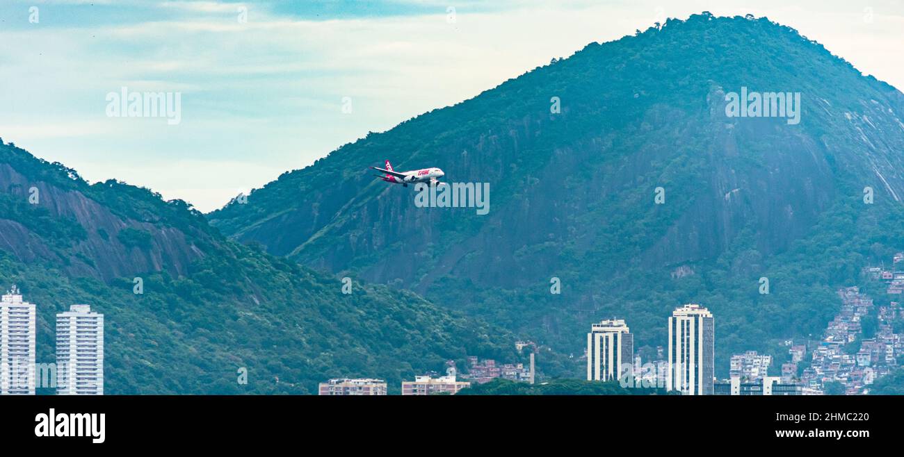 Rio de Janeiro, Brazil - CIRCA 2020: Brazilian commercial airline TAM Linhas Aéreas flying during the day Stock Photo