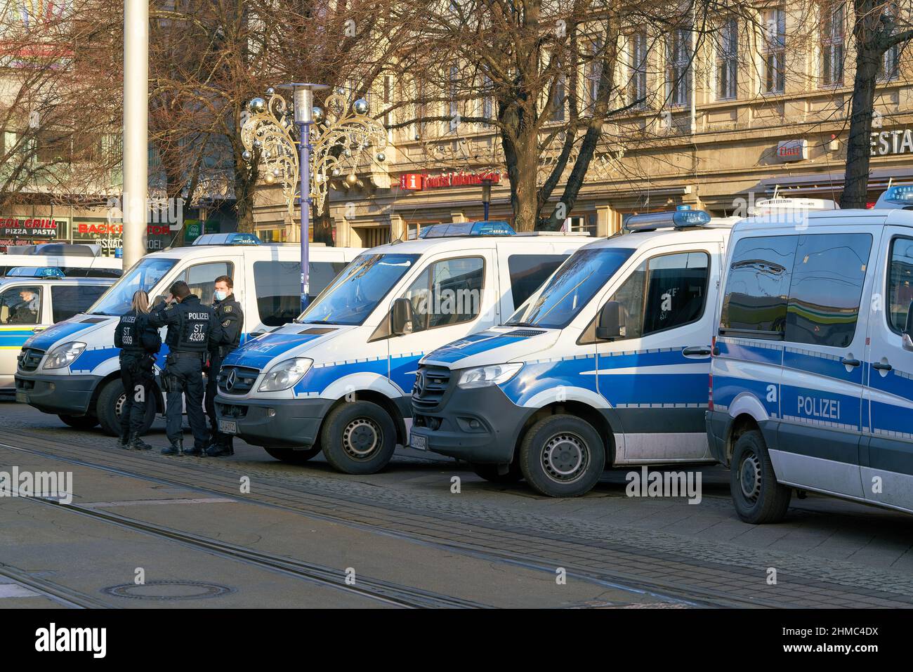 Police security forces during protests by opponents of the Corona measures and compulsory vaccination in downtown Magdeburg in Germany Stock Photo