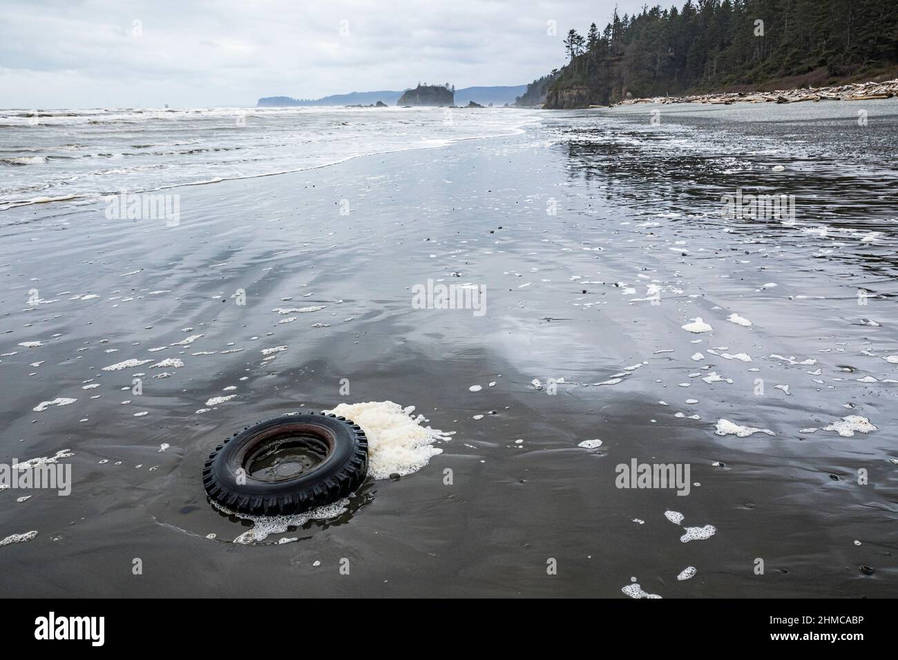 An old wheel washed up on Ruby Beach, Washington, USA. Stock Photo