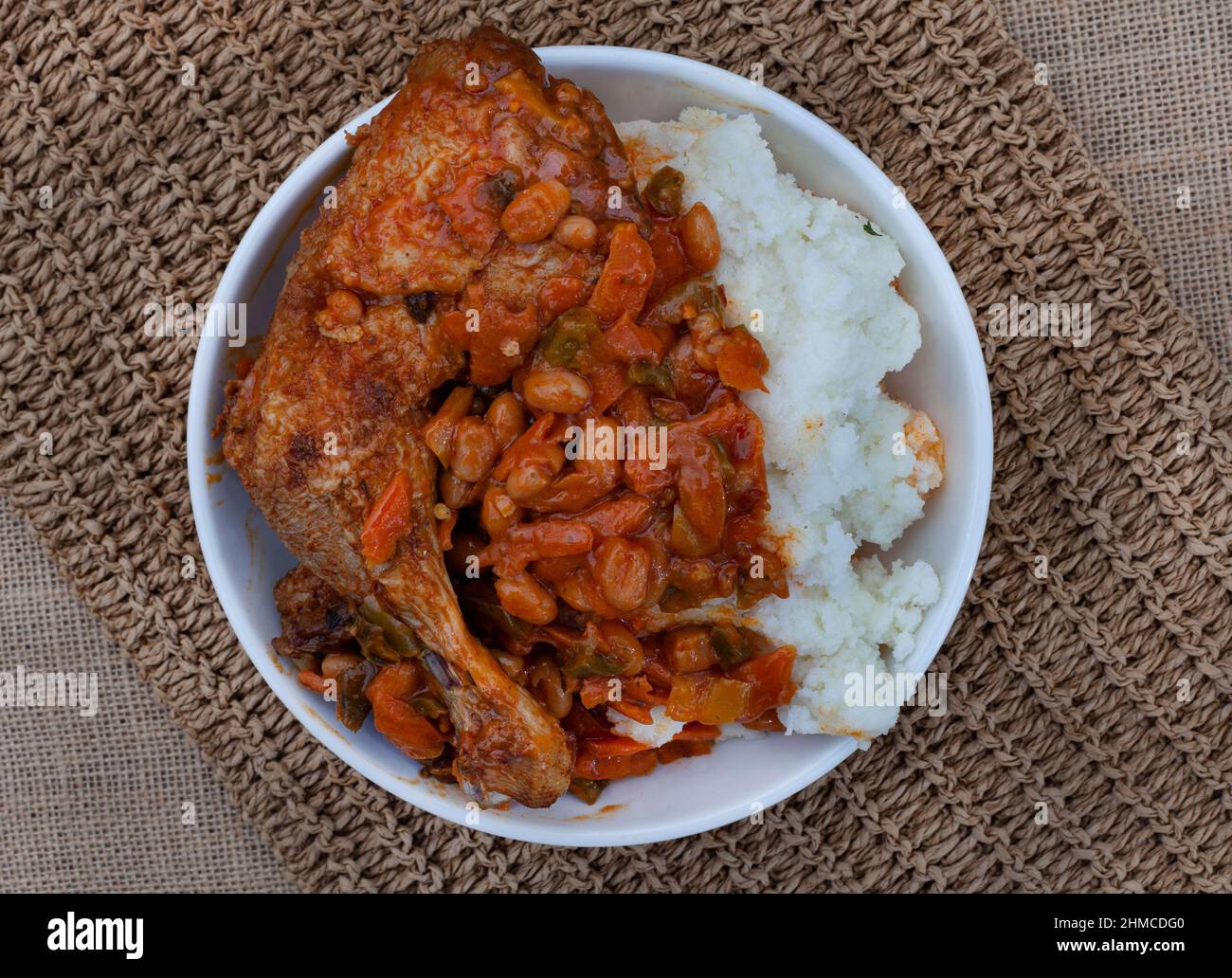 Traditional south African pap and roasted chicken, maize meal with