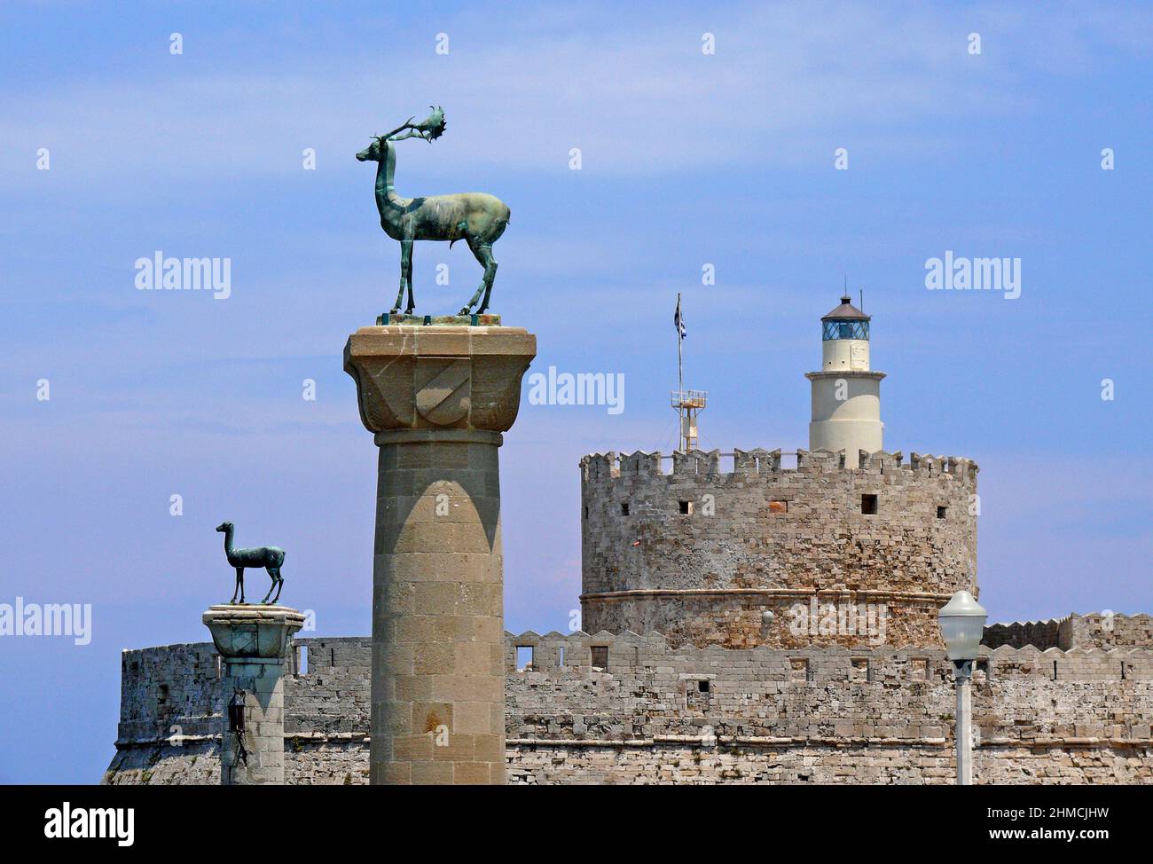 Mandraki harbour and fortress Agios Nicolaos,Rhodos city, Rhodos island, Greece Stock Photo