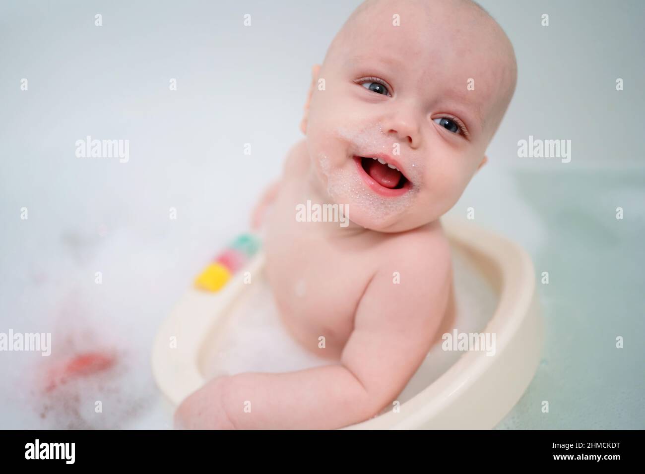 baby bathes in the bathroom Stock Photo Alamy