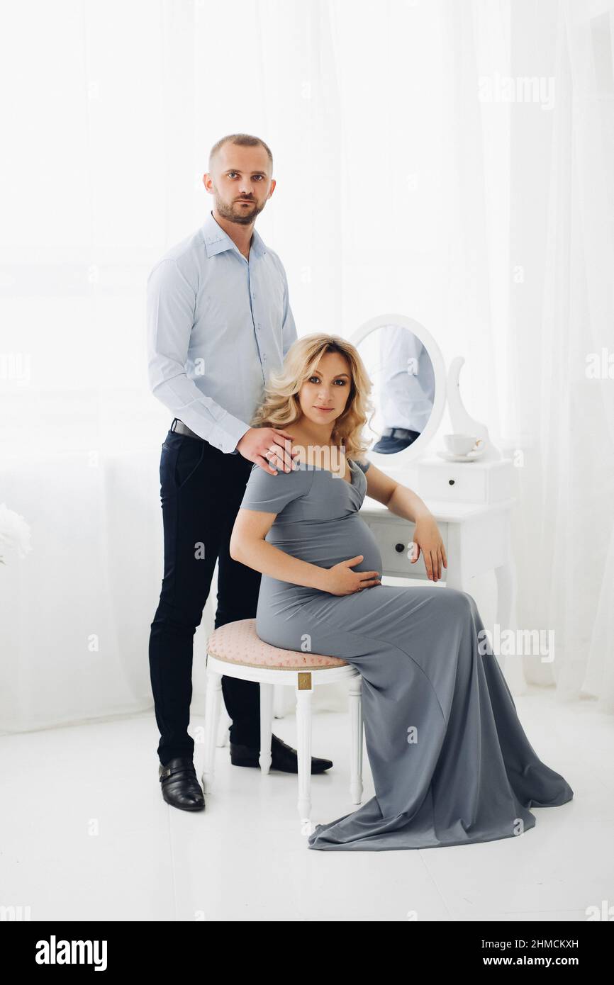 Couple handsome man and pregnant woman taking self portrait Stock Photo ...