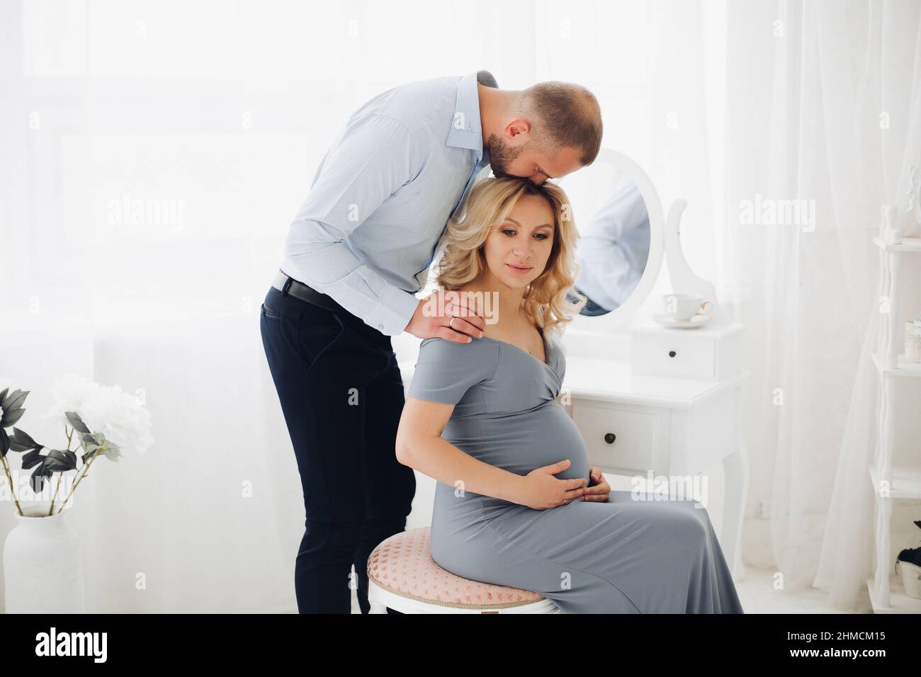 Couple handsome man and pregnant woman taking self portrait Stock Photo ...