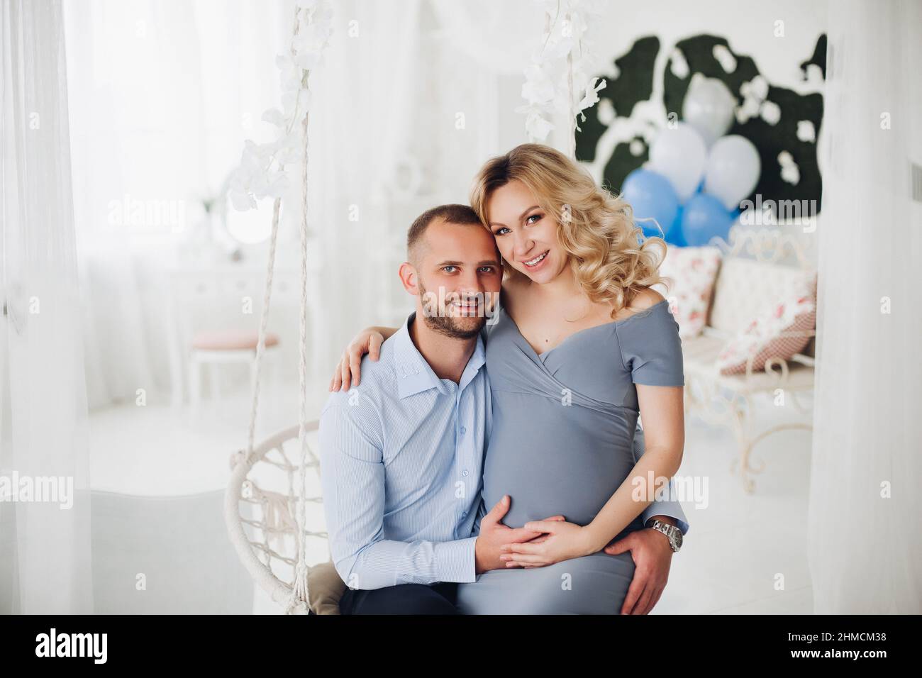Couple handsome man and pregnant woman taking self portrait Stock Photo ...