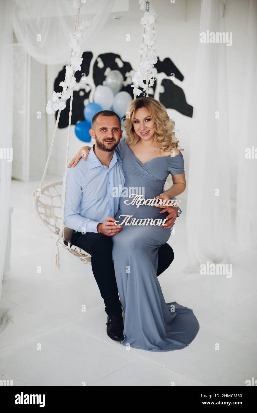 Couple handsome man and pregnant woman taking self portrait Stock Photo ...