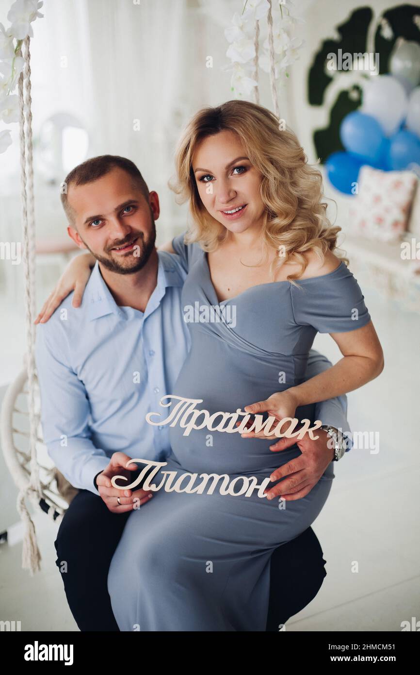 Couple handsome man and pregnant woman taking self portrait Stock Photo ...