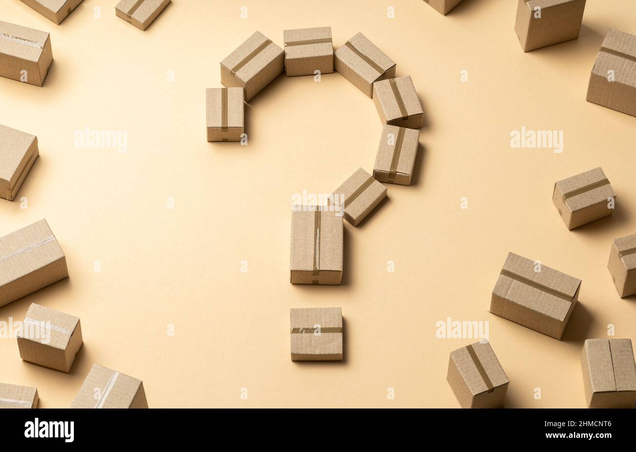 Question mark made from cardboard boxes on a brown background Stock ...