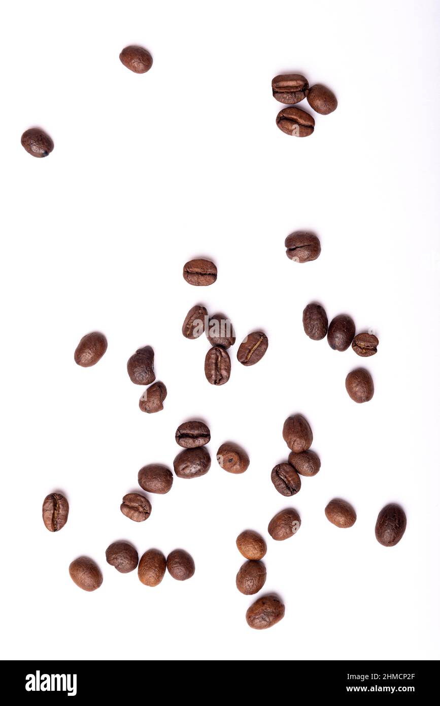 roasted coffee beans isolated on white background Stock Photo - Alamy