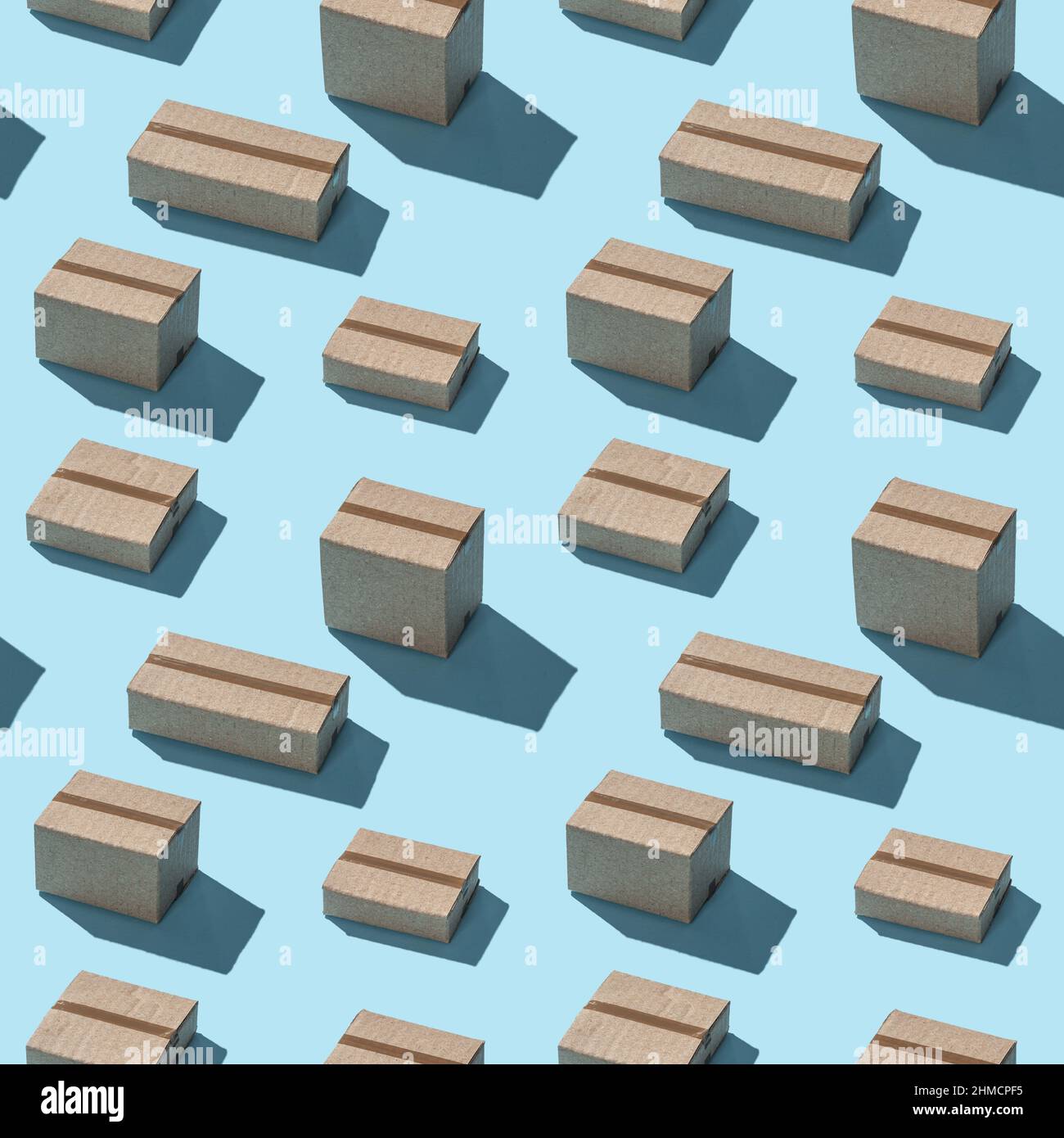 Cardboard boxes hard shadows geometric seamless pattern on blue background. Stock Photo