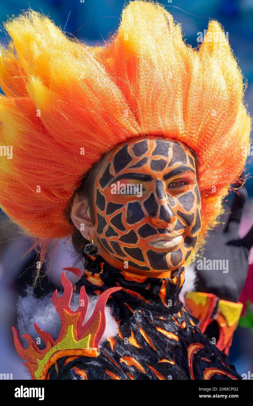 People in makeup and carnival costumes during Fat Tuesday at Mardi Gras carnival in city: Valletta, Malta - February 23, 2020 Stock Photo