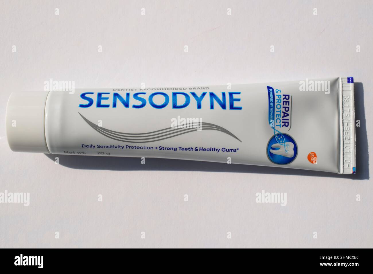 Sensodyne toothpaste tube brand product with white background Stock ...