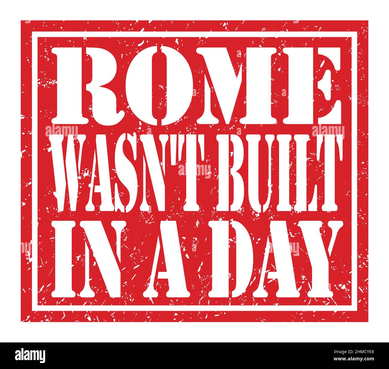 ROME WASN'T BUILT IN A DAY, words written on red stamp sign Stock Photo