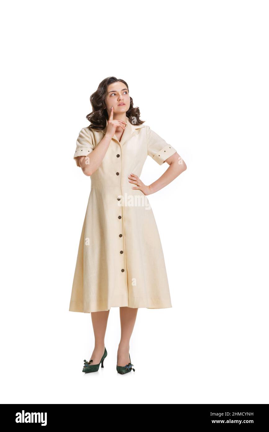 https://c8.alamy.com/comp/2HMCYNH/young-beautiful-girl-in-retro-style-dress-fashion-of-70s-80s-years-posing-isolated-on-white-studio-background-with-copyspace-for-ad-2HMCYNH.jpg
