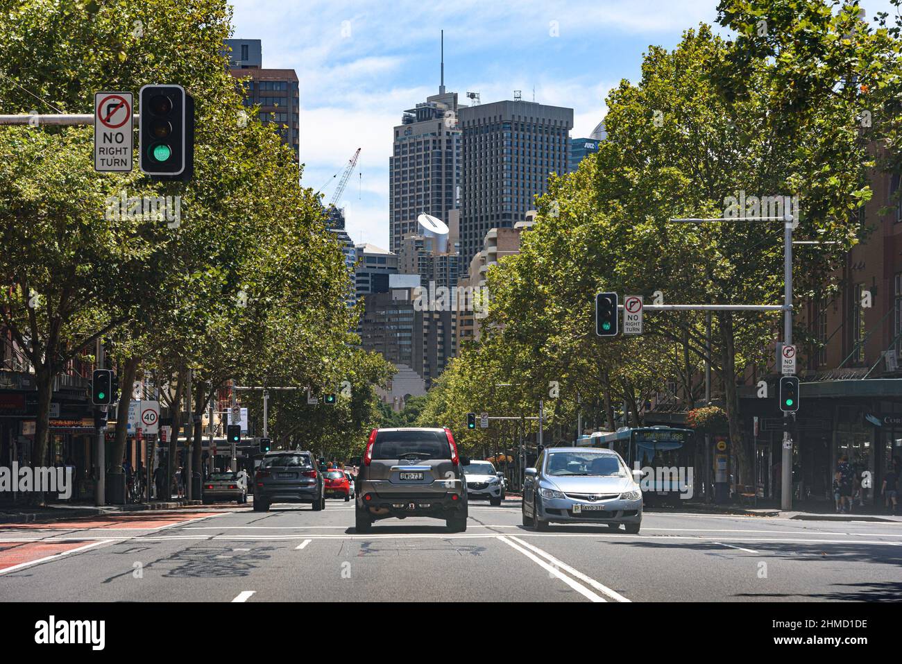 Looking northwest on Oxford Street in Sydney with cars on the road Stock Photo