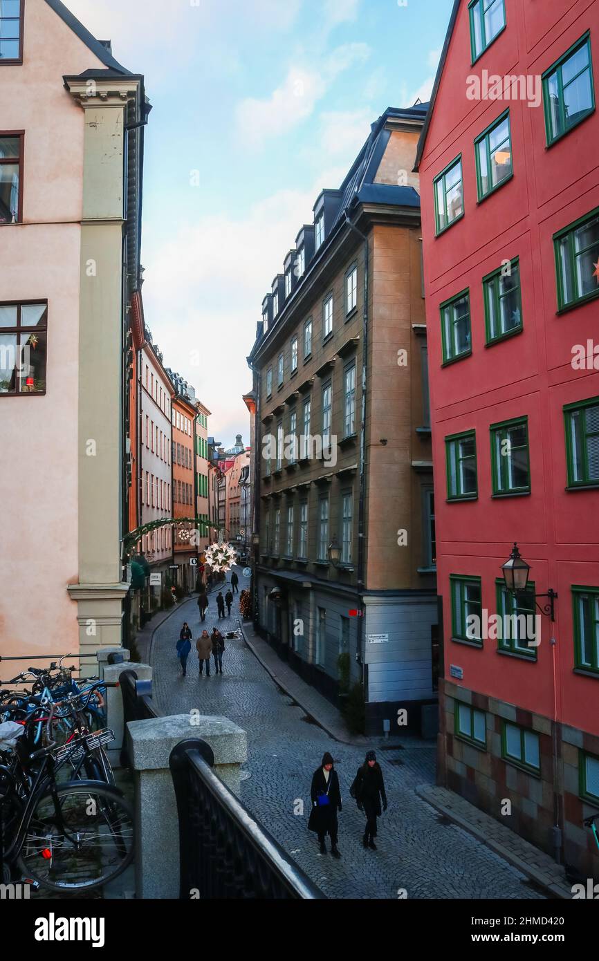 Colourful buildings on a street at Christmas in Gamla Stan; island in the centre of Stockholm, Sweden. High quality photo. Stock Photo