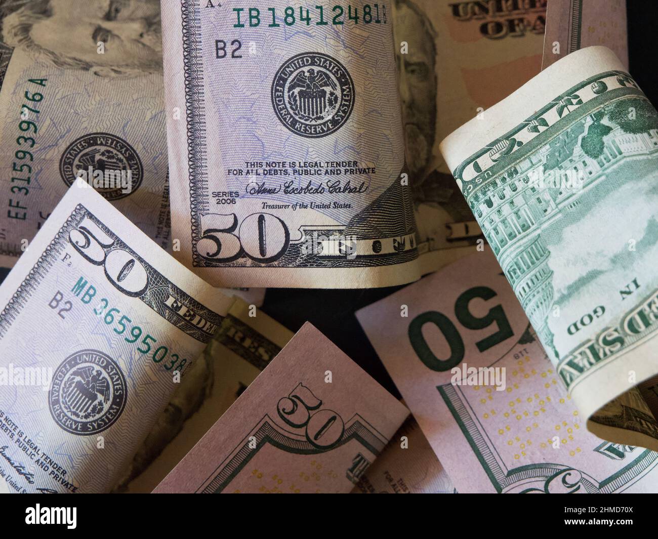 Banknotes with a face value of 50 dollars closeup. American paper