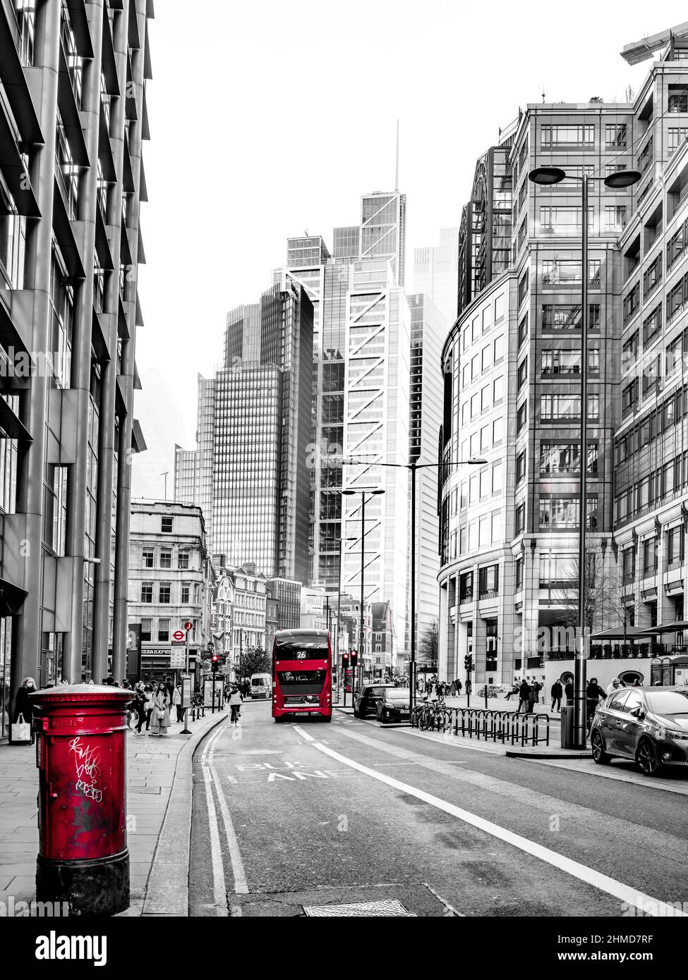 Red postbox and bus on Bishopgate. Stock Photo