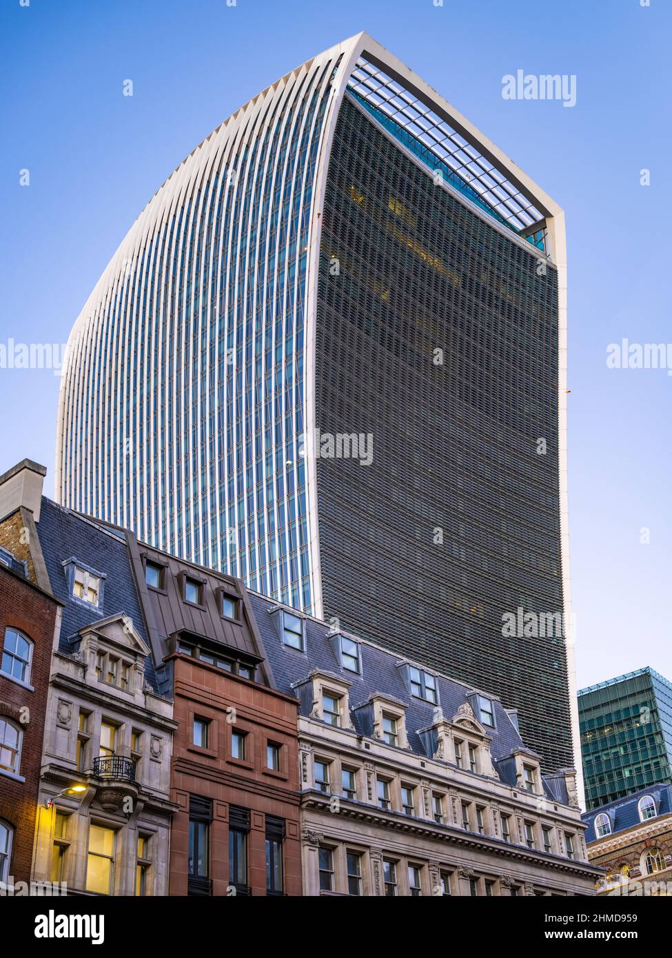 The Walkie-Talkie, Fenchurch Building, with blue sky rises above Eastcheap. Stock Photo