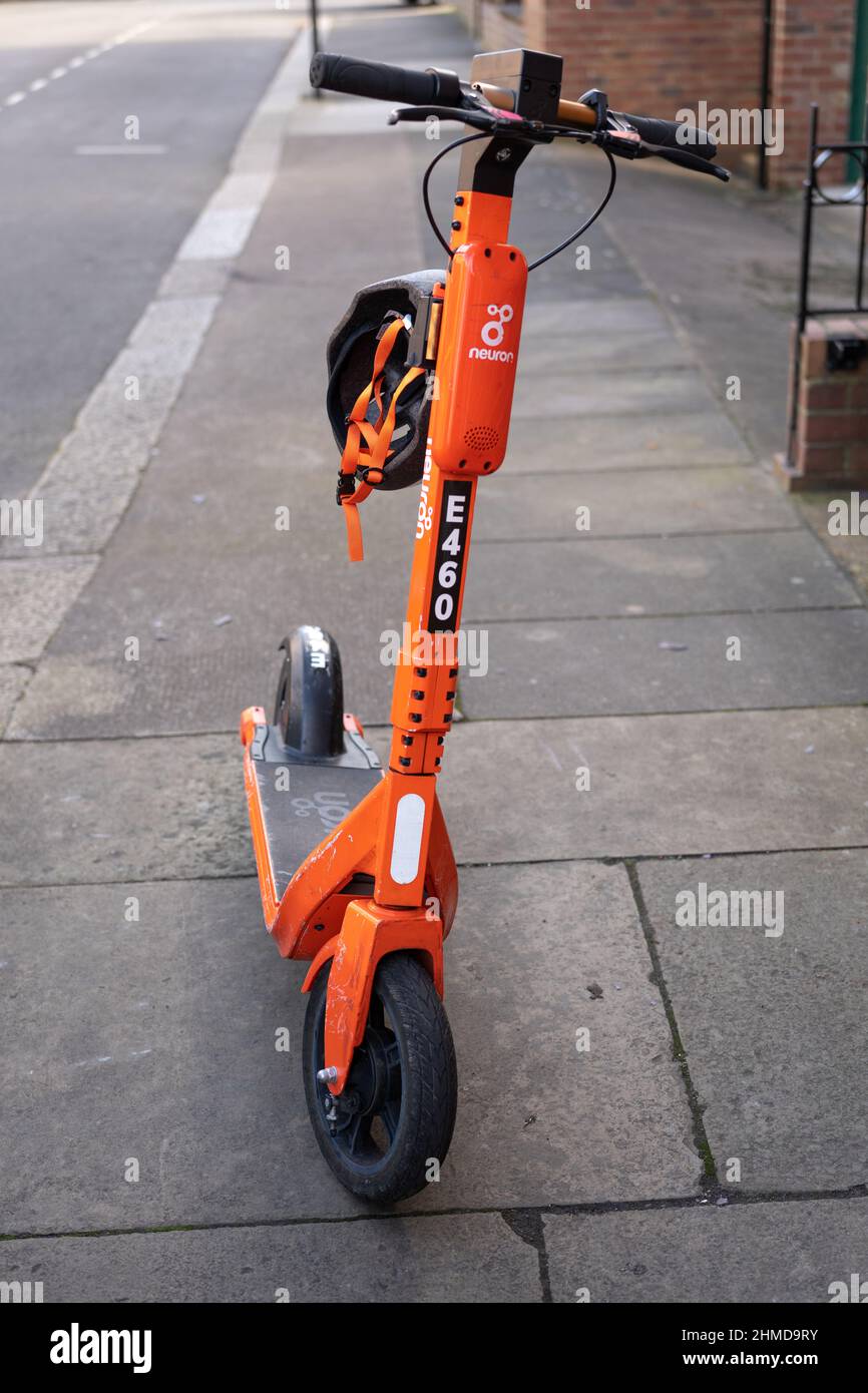 Sustainable transport. E-scooters for hire in Newcastle upon Tyne, UK. The year-long Neuron scheme has been extended. Stock Photo