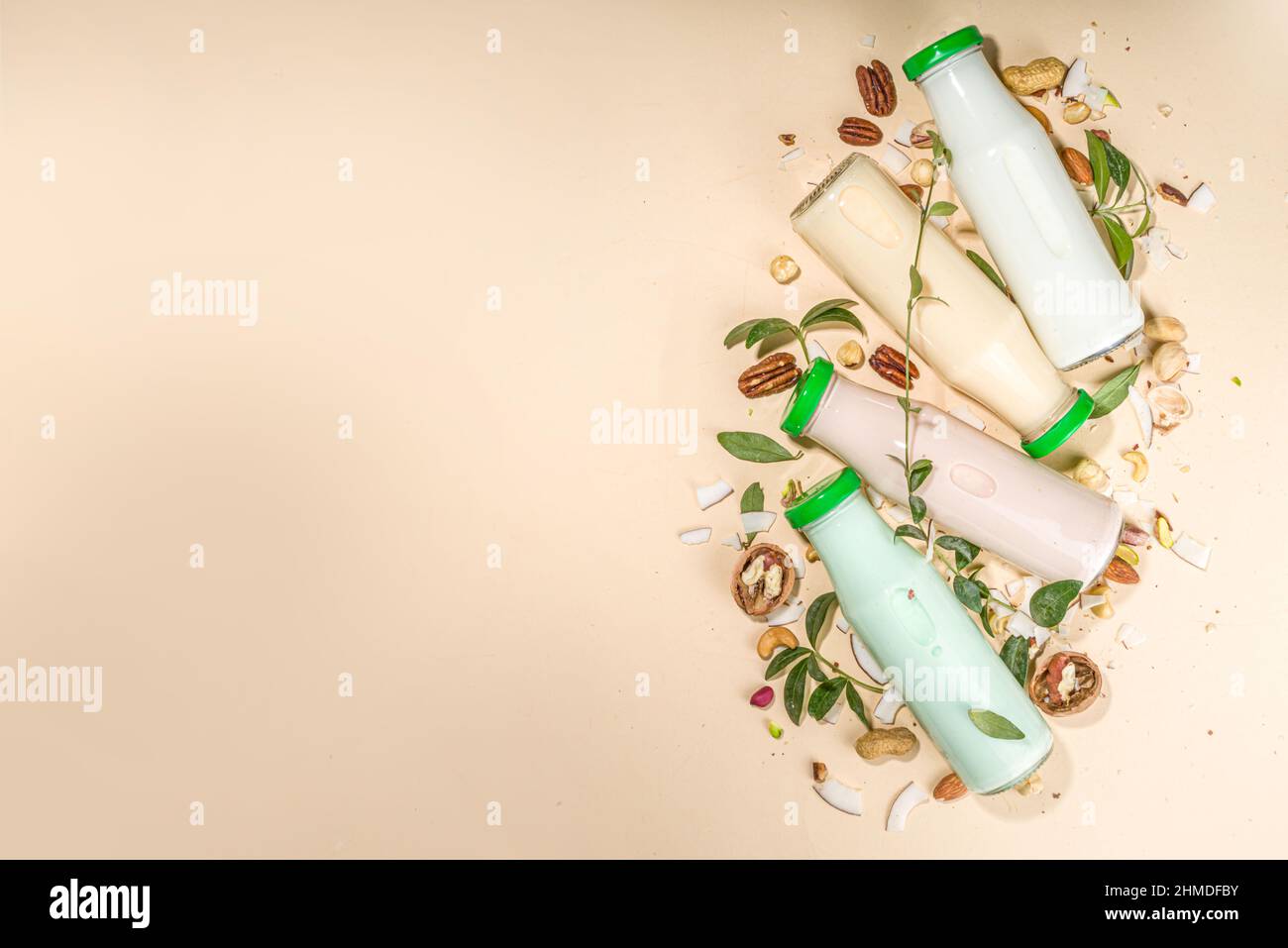 keto, paleo and vegan diet concept. Set of nut milks, bottles with